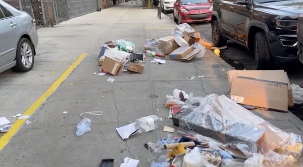 Garbage left strewn on the sidewalk