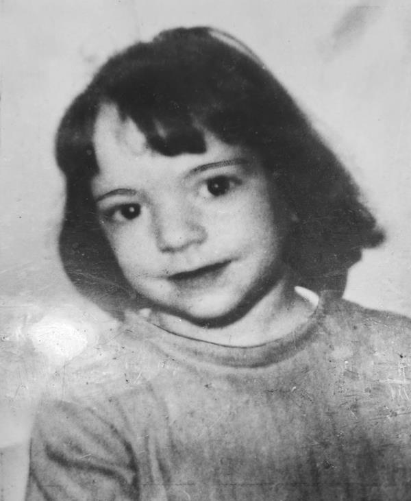 a black and white image of 4 year old Theresa Riccio
