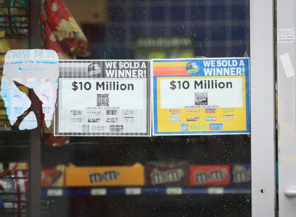 The winning lottery tickets in the window of the store. 