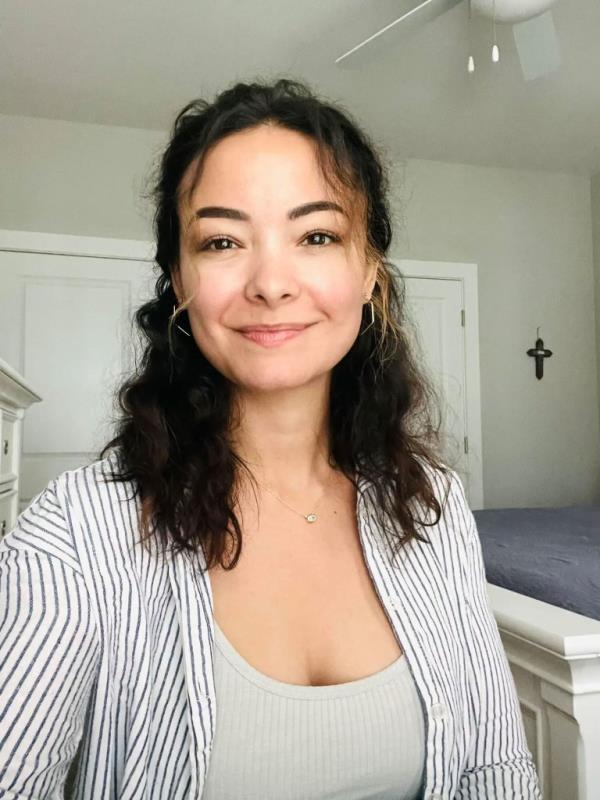 A photo showing Mica Miller alone.