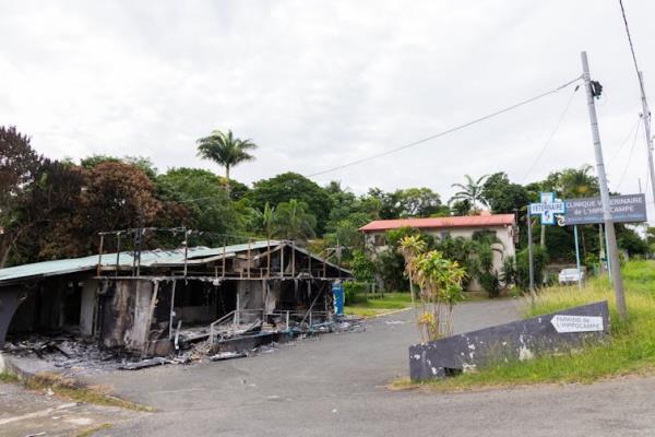 A building set on fire during the unrest.