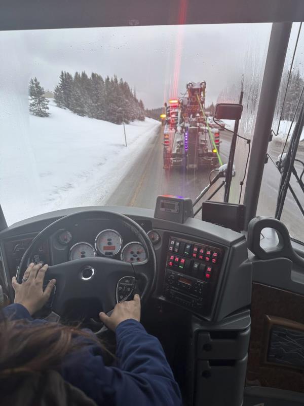 The Thera-ski bus is seen getting towed over Vail Pass, Colo., on Wednesday after the transmission overheated.