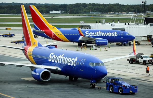 Southwest Airlines airplane taxies from a gate at Baltimore Washington Internatio<em></em>nal Thurgood Marshall Airport on October 11, 2021 in Baltimore, Maryland