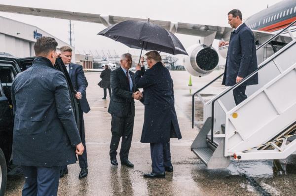Former President Do<em></em>nald Trump arriving at MacArthur Airport in Long Island, greeted by County Executive Bruce Blakeman, to attend NYPD Officer Jo<em></em>nathan Diller's funeral.