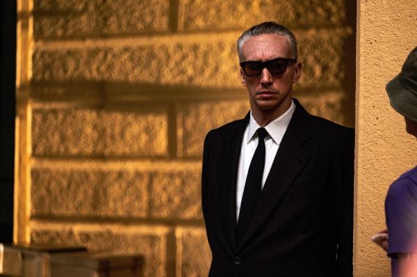 Adam Driver wearing sunglasses. 