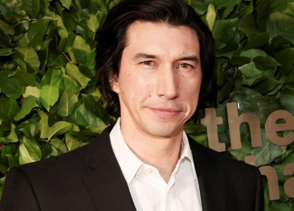 Adam Driver smiling. 