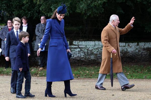 Kate Middleton, Prince George, and Prince Louis walking away from a church on Christmas Day.