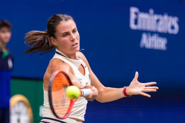 Emma Navarro of the USA returns a ball to Coco Gauff of the USA during their fourth round match at the US Open Tennis Tournament Sunday, Sept. 1, 2024.