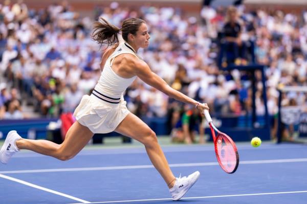 Emma Navarro of the USA returns a ball to Coco Gauff of the USA during their fourth round match at the US Open Tennis Tournament Sunday, Sept. 1, 2024.