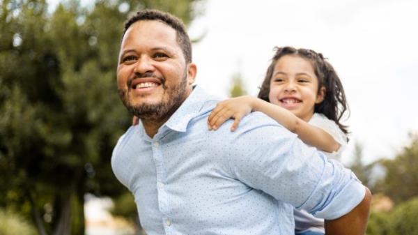 A woman on the balcony of a cruise ship