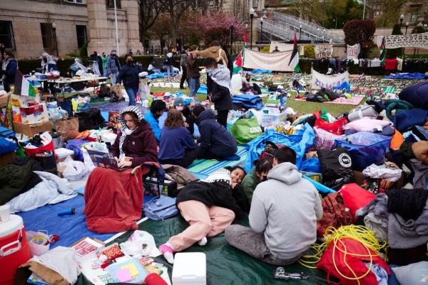 Pro-Palestinian demo<em></em>nstrators gather at an encampment on the lawn of Columbia University
