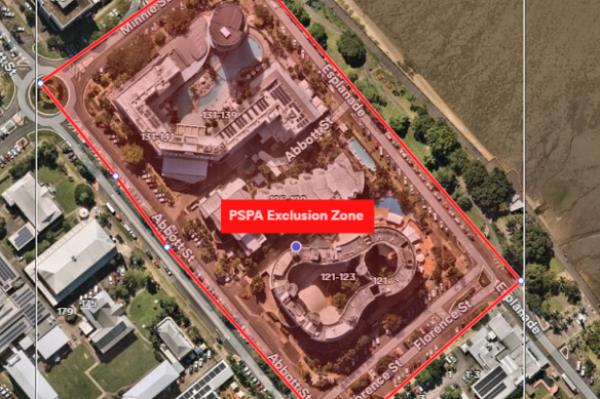 Streets have been closed after a helicopter crashed into a hotel roof in Cairns.