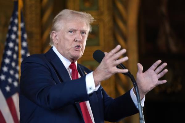 Republican presidential nominee former president Do<em></em>nald Trump speaks to reporters.