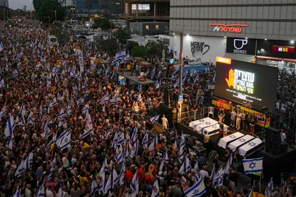 People take part in a protest calling for a deal for immediate release of hostages held in the Gaza Strip by the Hamas militant group, in Tel Aviv.
