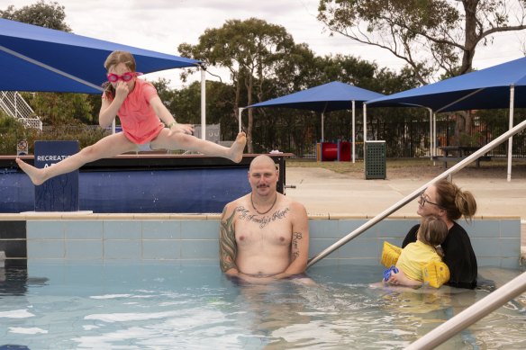 Morgan and John Morgan with daughters Sadie, 6, and Remi, 3, at Pines on Saturday.