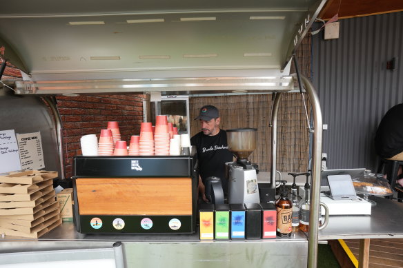 Broulee Brewhouse general manager David Quinton makes coffees in late December. The bad weather has had more of an effect than cost of living pressures, he says.