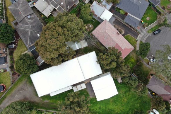 The scout hall is close to homes.