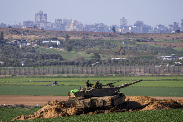 An Israeli tank in a position on the border with the Gaza Strip, as seen from southern Israel.